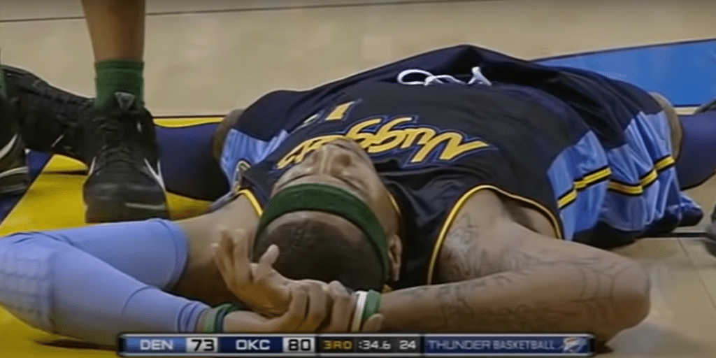 Carmelo Anthony Collapses and Play Goes On