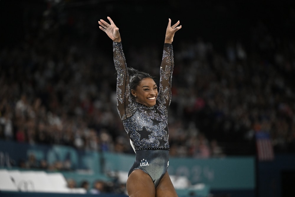 US Olympic gymnast Simone Biles performs with the US gymnastics team at the Paris Olympics