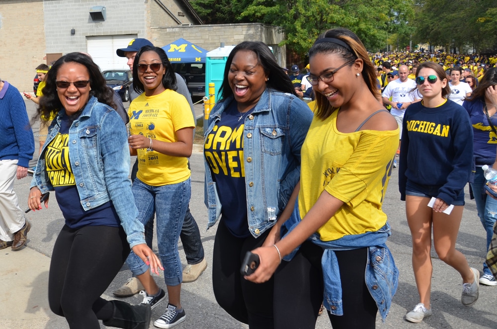Tens of thousands of Michigan alumni descend on Ann Arbor every year to cheers on their team. (Shutterstock)
